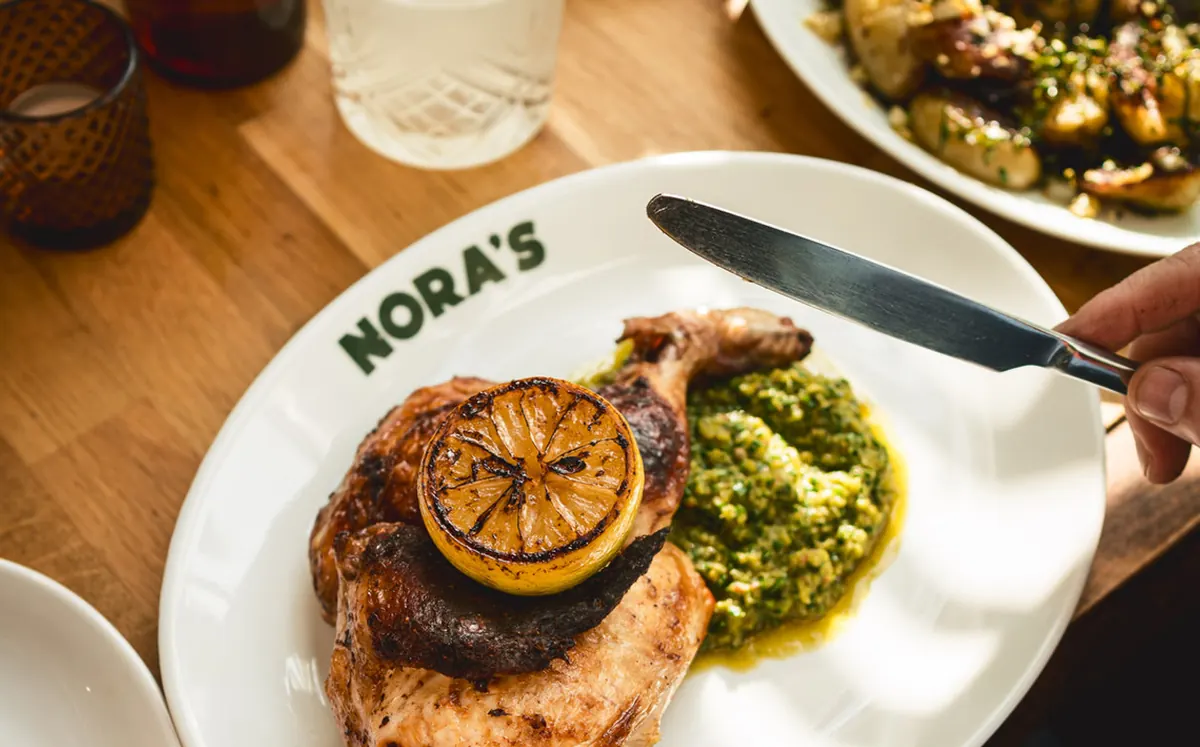 Citrus chicken with charred lemon and green sauce